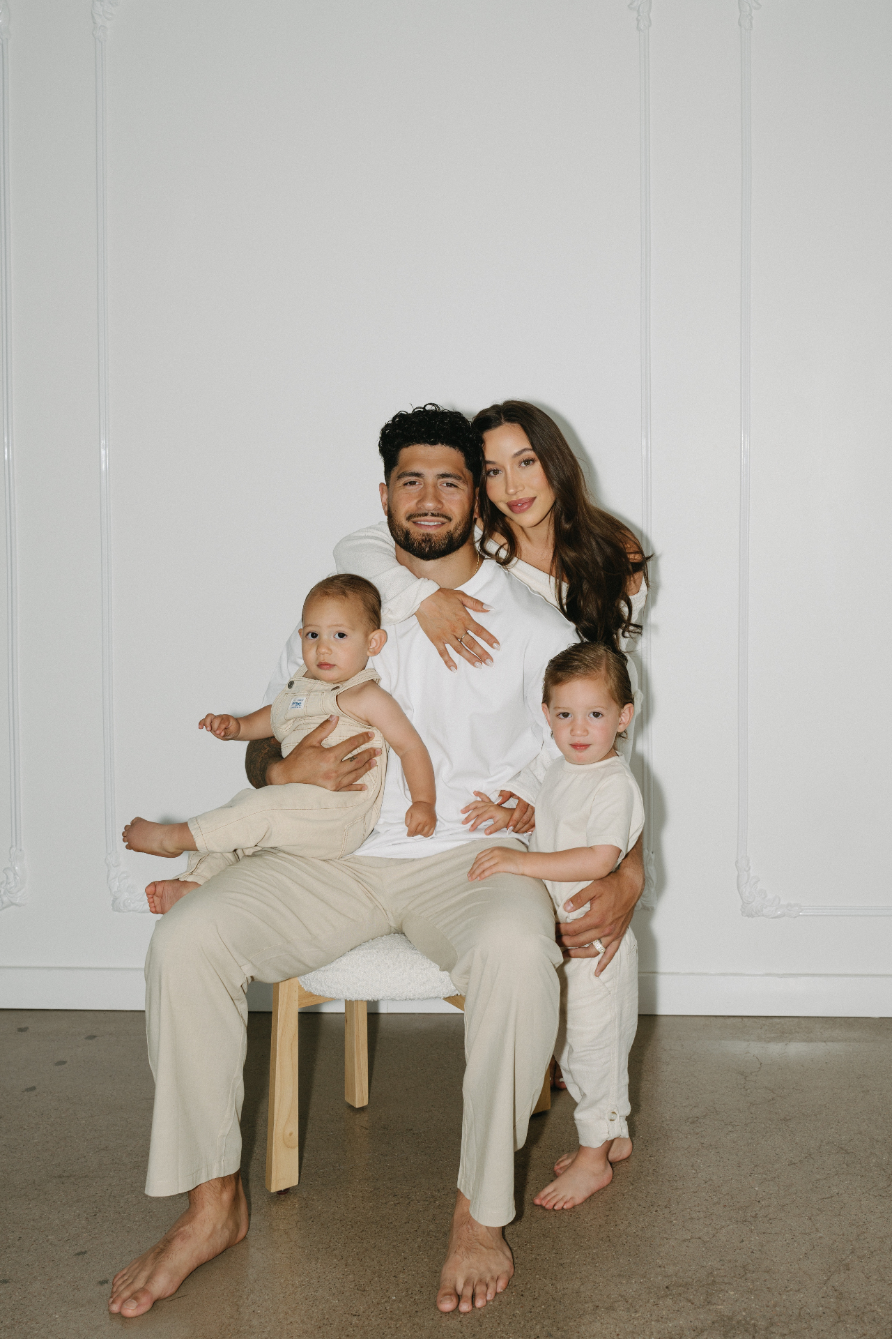 Cyrus with his wife and two sons
